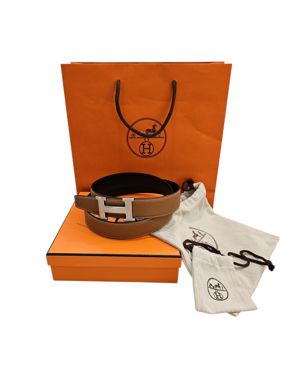 Hermès Reversible leather strap 32 mm in Noir/Gold w/ Brushed Palladium Buckle